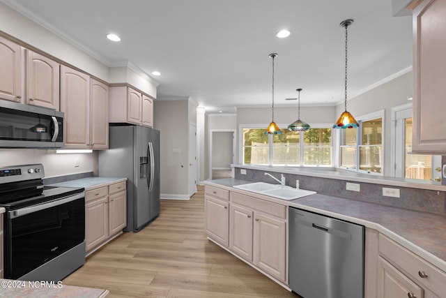 kitchen with pendant lighting, stainless steel appliances, light brown cabinetry, sink, and light wood-type flooring