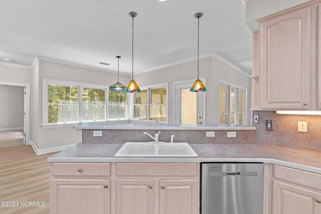 kitchen with decorative light fixtures, light brown cabinetry, sink, decorative backsplash, and stainless steel dishwasher