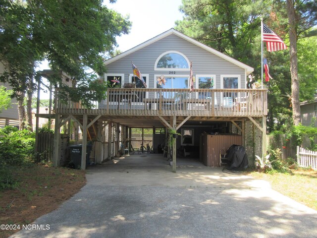 exterior space with a carport