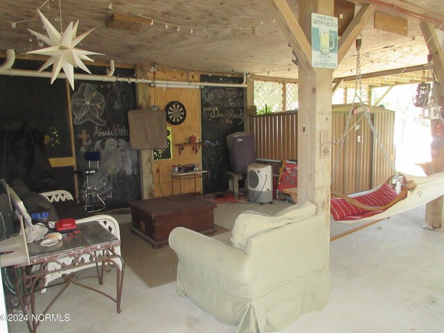 living room with concrete flooring