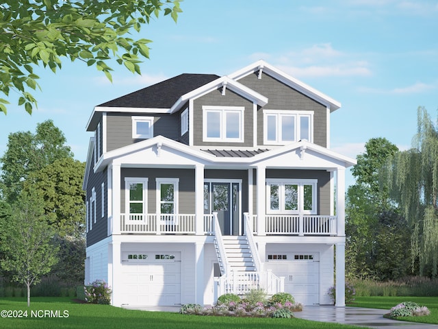 view of front of home featuring covered porch and a garage