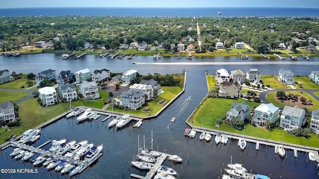 bird's eye view with a water view