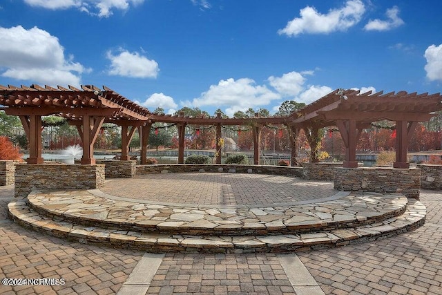 view of patio featuring a pergola