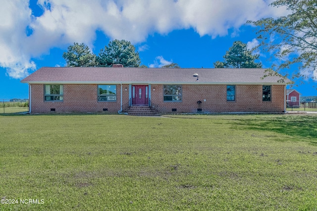 single story home with a front lawn