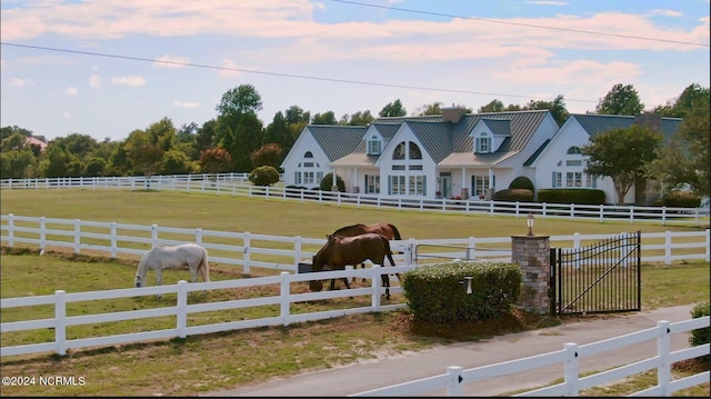 view of stable featuring a rural view