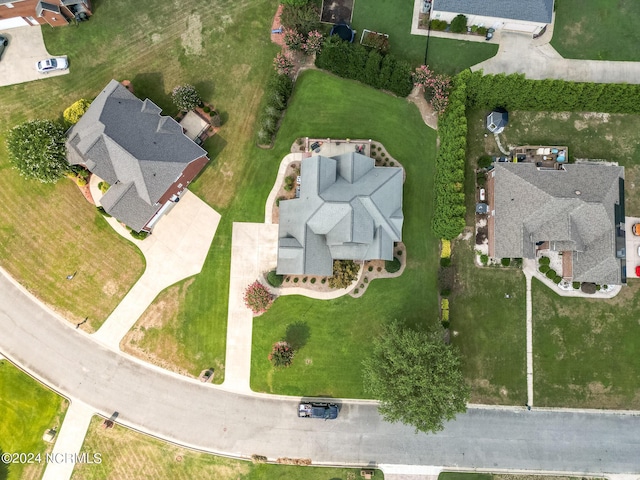 birds eye view of property with a residential view