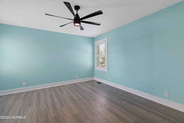 unfurnished room with wood-type flooring and ceiling fan