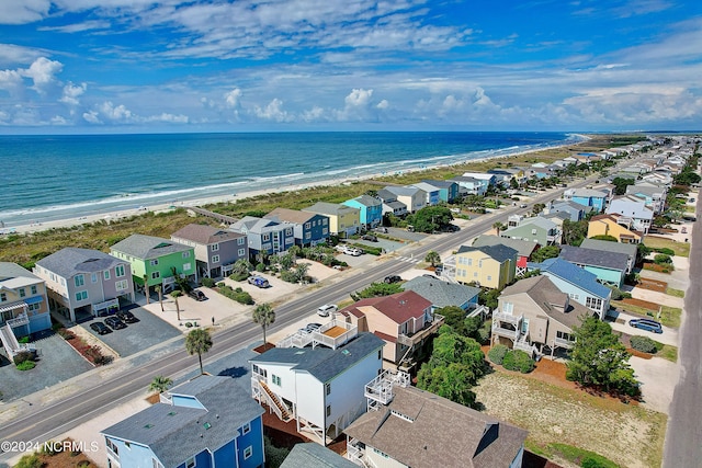 drone / aerial view with a view of the beach and a water view