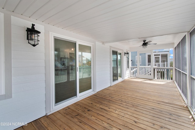 wooden terrace with ceiling fan