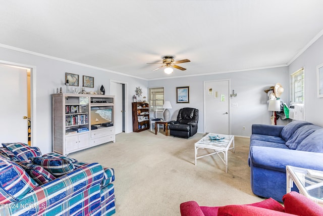 carpeted living room featuring crown molding and ceiling fan