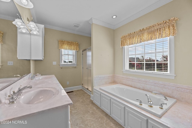 bathroom with crown molding, a sink, and a bath