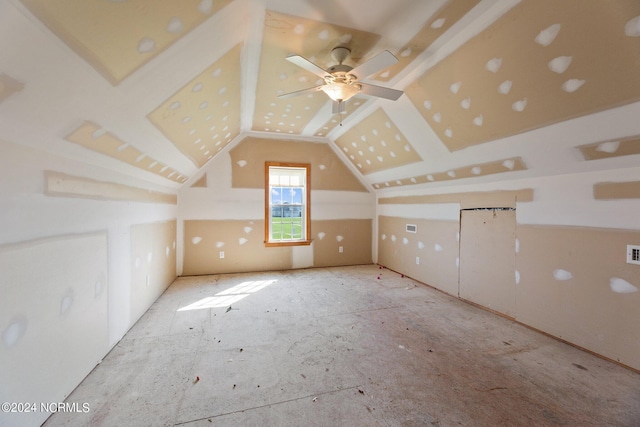 additional living space featuring lofted ceiling, ceiling fan, and visible vents