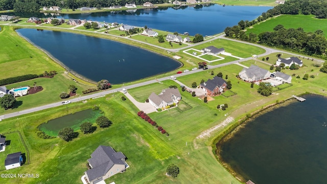 aerial view with a water view and a residential view