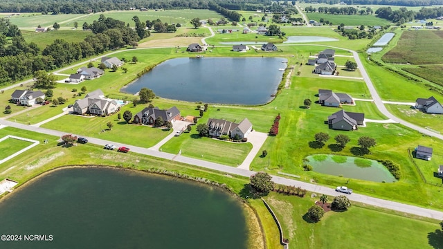 aerial view with a water view and a residential view