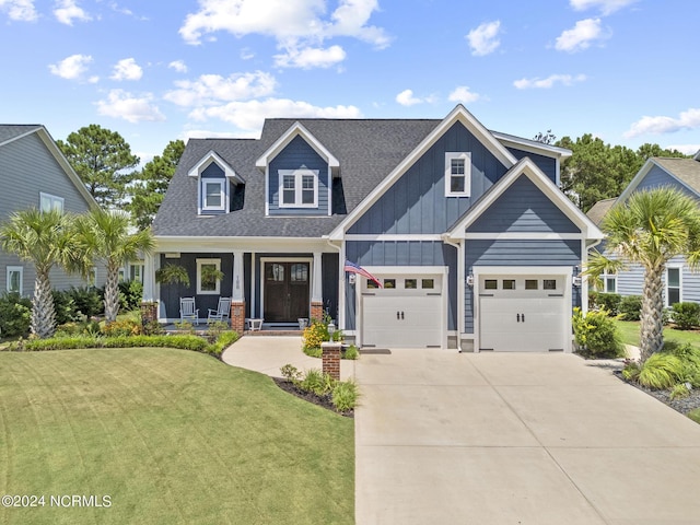 view of front of house featuring a front yard and covered porch