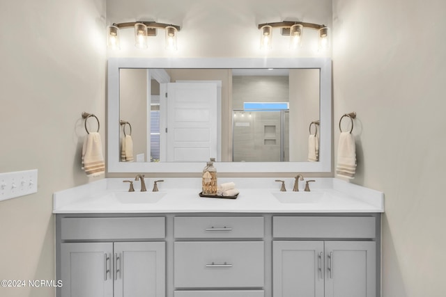 bathroom with vanity and walk in shower