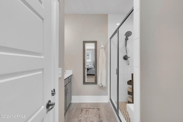 bathroom featuring vanity and walk in shower