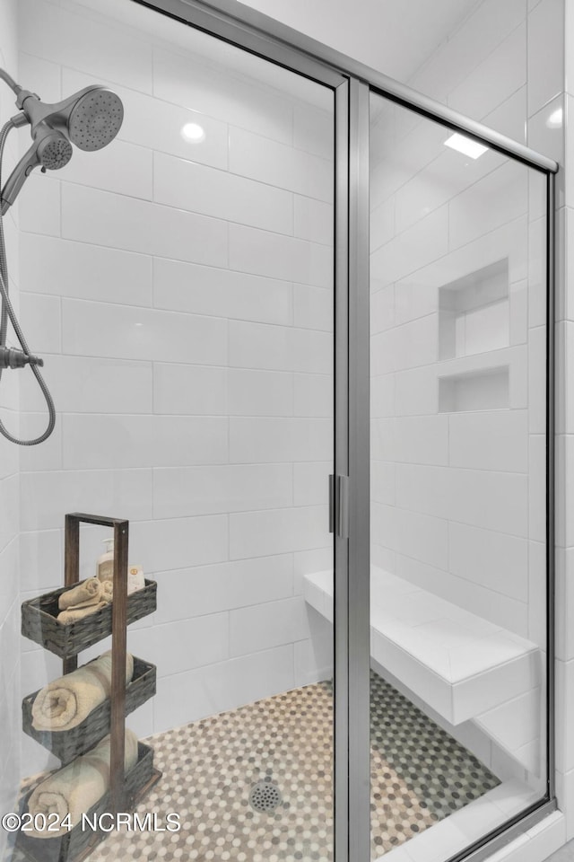 bathroom with an enclosed shower