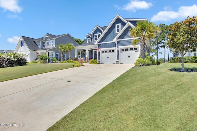 view of front facade with a garage and a front yard