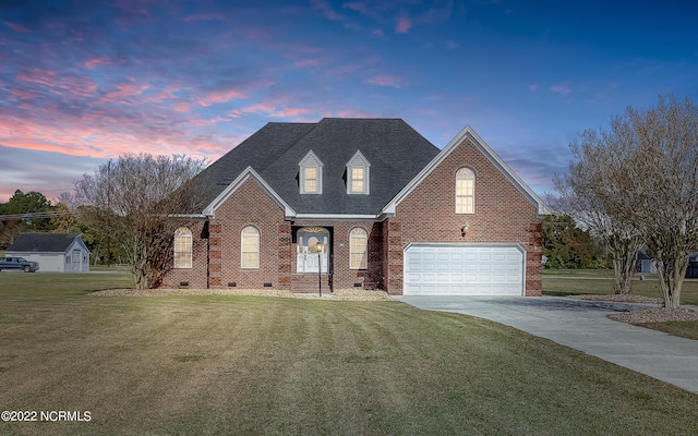 cape cod-style house featuring brick siding, concrete driveway, crawl space, roof with shingles, and a front yard