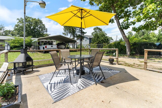 view of patio with a carport