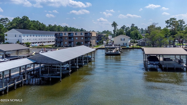 view of dock featuring a water view and boat lift