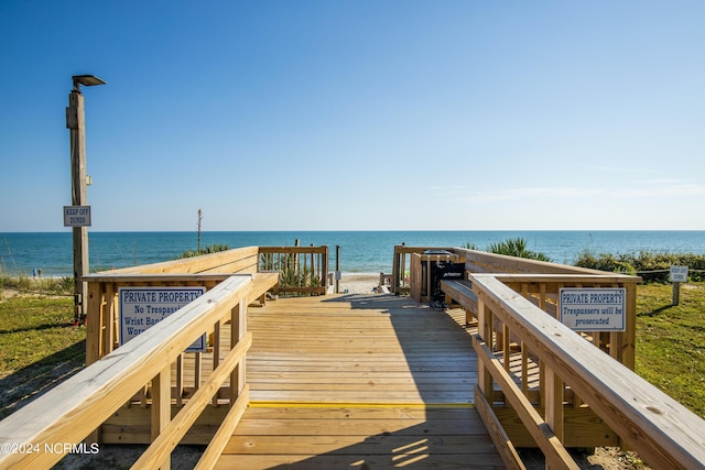 dock area featuring a water view