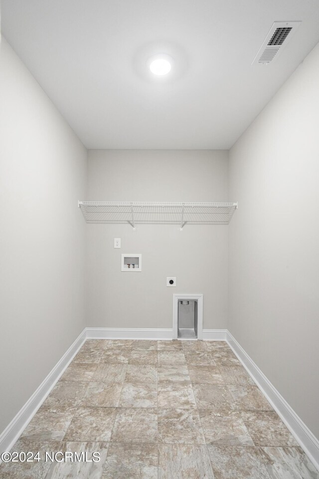 laundry room featuring tile patterned flooring, hookup for an electric dryer, and washer hookup