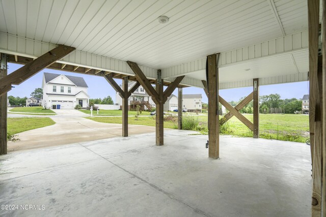 view of patio featuring a garage