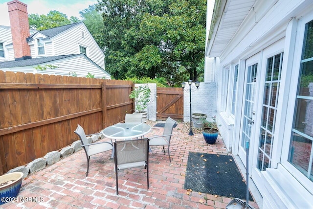 view of patio featuring french doors