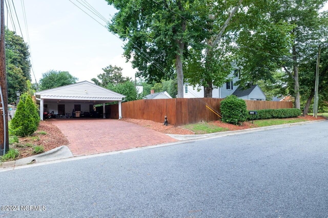 exterior space featuring a carport