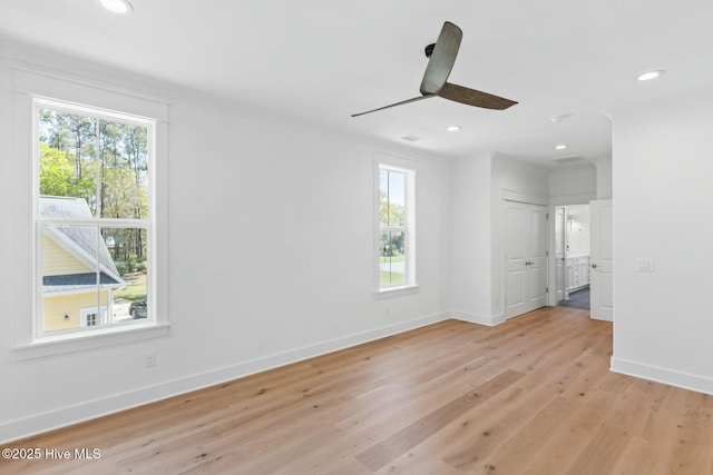 3404 Eagle Crest Dr SW, Supply, NC 28462 - unfurnished room featuring healthy amount of natural light, light wood-type flooring, a ceiling fan, baseboards, and recessed lighting