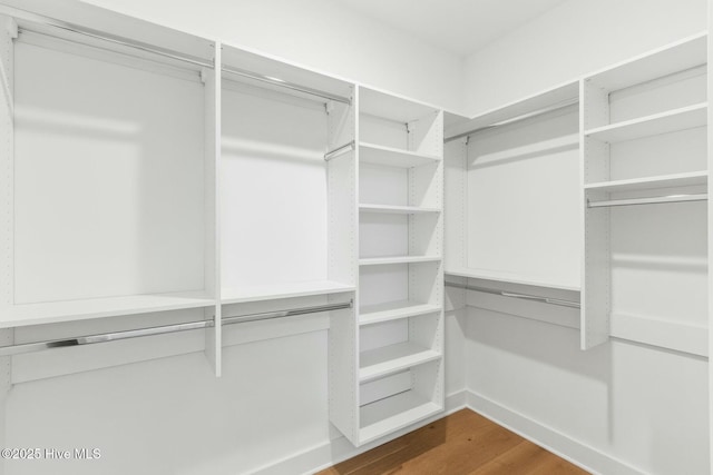 3404 Eagle Crest Dr SW, Supply, NC 28462 - walk in closet featuring dark wood-style flooring