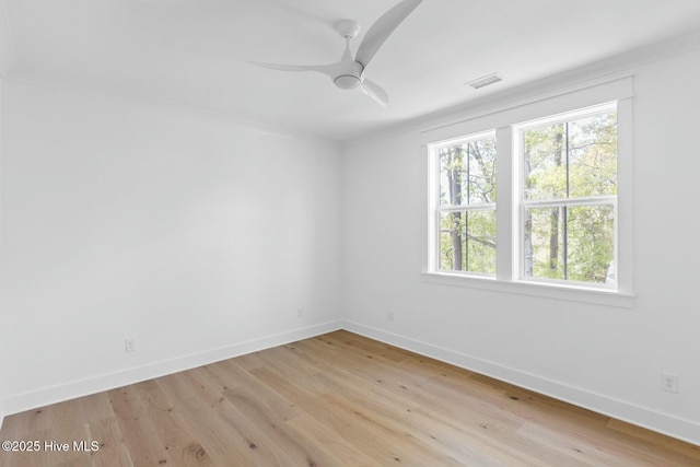 3404 Eagle Crest Dr SW, Supply, NC 28462 - spare room with baseboards, light wood-style flooring, and ceiling fan