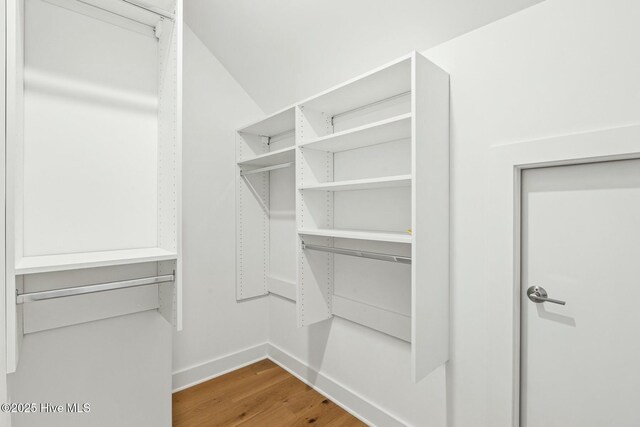 3404 Eagle Crest Dr SW, Supply, NC 28462 - walk in closet featuring wood finished floors