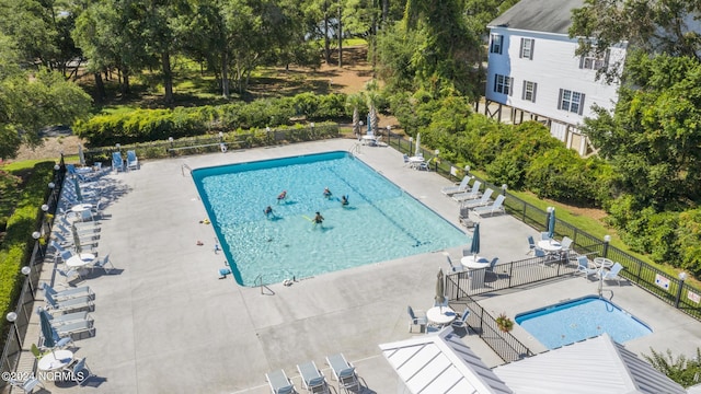 3404 Eagle Crest Dr SW, Supply, NC 28462 - community pool with a patio and view of scattered trees