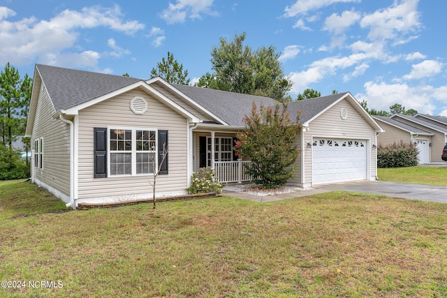 ranch-style house with a garage, a front yard, and covered porch