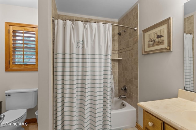 full bathroom with shower / bath combo with shower curtain, vanity, and toilet