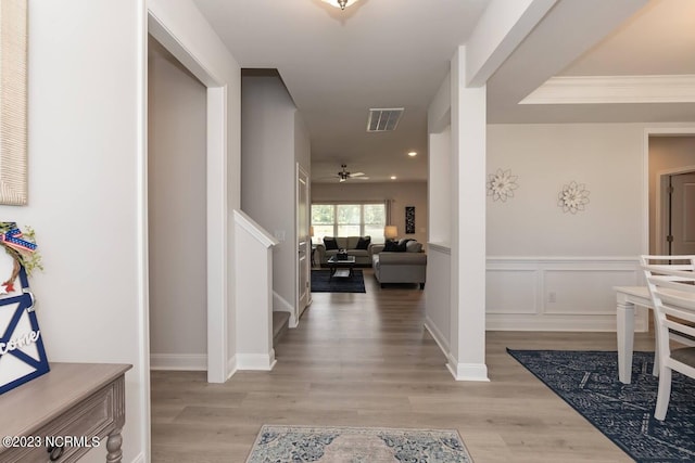 hallway with light wood-type flooring