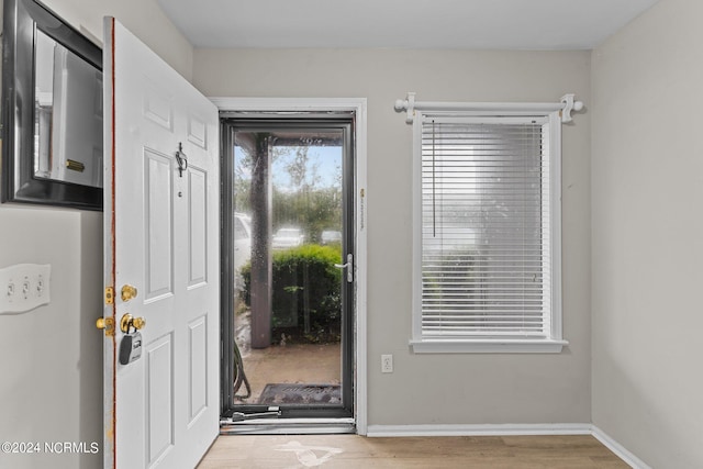 entrance foyer featuring light wood-type flooring