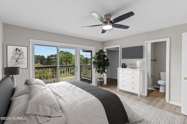 bedroom with ceiling fan, light hardwood / wood-style floors, access to outside, a walk in closet, and ensuite bathroom