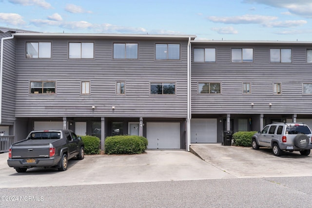 view of property featuring a garage