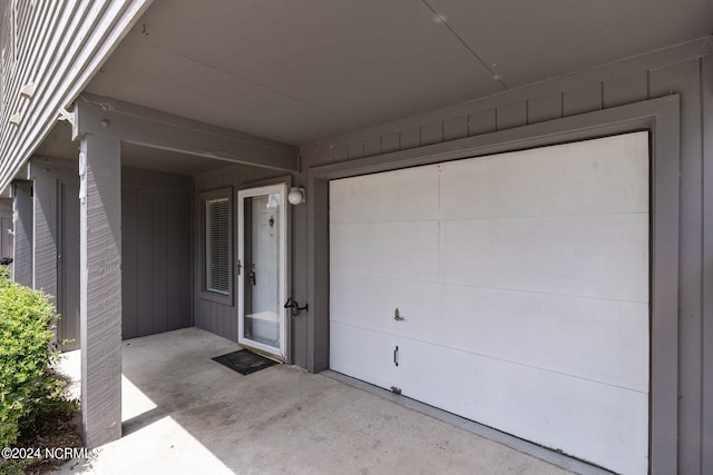 garage with wood walls