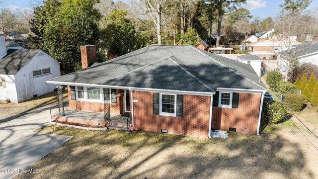 view of outdoor structure featuring a yard