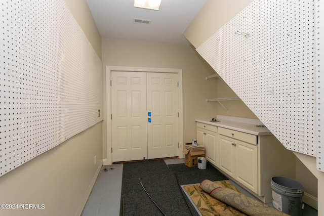 interior space featuring visible vents and baseboards