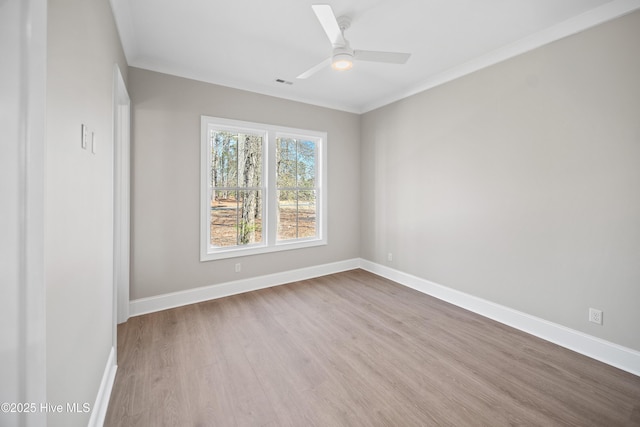 3772 Barnesmore Dr, Castle Hayne, NC 28429 - empty room with wood finished floors, crown molding, and a ceiling fan