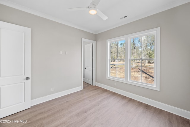3772 Barnesmore Dr, Castle Hayne, NC 28429 - unfurnished room featuring light wood finished floors, ceiling fan, and ornamental molding