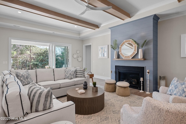 3772 Barnesmore Dr, Castle Hayne, NC 28429 - living area featuring beamed ceiling, wood finished floors, a fireplace, ceiling fan, and crown molding