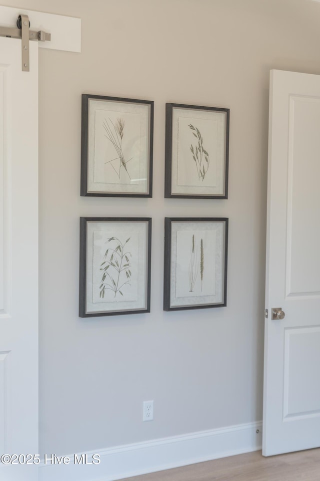 3772 Barnesmore Dr, Castle Hayne, NC 28429 - detailed view of a barn door and wood finished floors