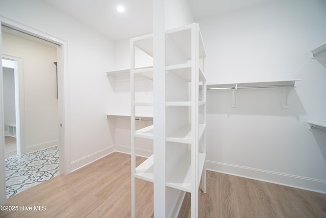 3772 Barnesmore Dr, Castle Hayne, NC 28429 - spacious closet featuring wood finished floors